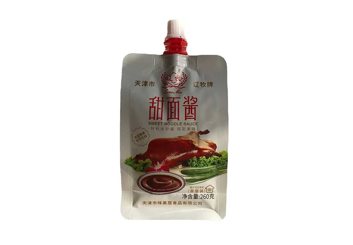 甜面醬包裝革新者 —— 全自動(dòng)自立吸嘴袋灌裝旋蓋機(jī)，高效賦能食品工廠量產(chǎn)