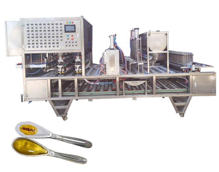 1729319598811700.jpg 勺子蜂蜜灌裝封口機11111.jpg